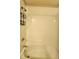 A clean white bathtub with a shower head and chrome fixtures at 813 Marsh Reed Dr, Winter Garden, FL 34787