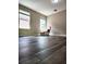 Bright bedroom with wood laminate flooring, neutral walls and natural light at 813 Marsh Reed Dr, Winter Garden, FL 34787