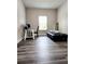Versatile bedroom featuring modern flooring, natural light and a functional layout at 813 Marsh Reed Dr, Winter Garden, FL 34787