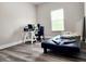 Versatile bedroom featuring modern flooring, natural light and a functional layout at 813 Marsh Reed Dr, Winter Garden, FL 34787