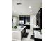 Spacious kitchen with dark cabinets, granite countertops, stainless steel appliances, and modern lighting at 813 Marsh Reed Dr, Winter Garden, FL 34787