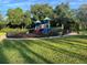 Community playground with colorful equipment and green space at 813 Marsh Reed Dr, Winter Garden, FL 34787