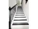 Elegant staircase features black wrought iron railing, white risers, and dark wood treads at 813 Marsh Reed Dr, Winter Garden, FL 34787