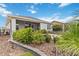 This backyard is beautifully landscaped with a patio, privacy fence and lovely plantings at 911 Tidal Pond Dr, Groveland, FL 34736