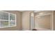 Inviting front entryway featuring lots of natural light and carpeted floor at 9650 Bay Pine Ln, Orlando, FL 32832