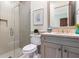 Modern bathroom with glass-enclosed shower, stylish vanity, and neutral tones for a spa-like retreat at 10143 Mattraw Pl, Golden Oak, FL 32836