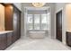 Luxurious bathroom features a soaking tub, stylish fixtures, and custom cabinetry, for ultimate relaxation at 10143 Mattraw Pl, Golden Oak, FL 32836