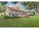 This home offers a private backyard with a fire pit and lawn for relaxing at 1073 Sadie Ln, Winter Garden, FL 34787