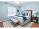 Cozy bedroom with a king bed, window, and lots of natural light at 1073 Sadie Ln, Winter Garden, FL 34787