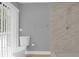 Bathroom with toilet and a marble-walled shower at 1102 Winter Springs Blvd, Winter Springs, FL 32708