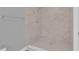 Walk-in shower featuring stylish marble walls and floor at 1102 Winter Springs Blvd, Winter Springs, FL 32708