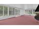 Enclosed sun room features ample windows and fireplace at 1102 Winter Springs Blvd, Winter Springs, FL 32708