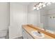 Bathroom showcasing a vanity with a sink and a mirror and shower with tub at 12843 Madison Pointe # 208, Orlando, FL 32821