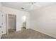 Bedroom with a walk-in closet and an ensuite bathroom at 12843 Madison Pointe # 208, Orlando, FL 32821