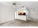 Inviting living space with open layout and direct kitchen access, ideal for modern living and entertaining at 12843 Madison Pointe # 208, Orlando, FL 32821