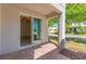 Private outdoor patio area accessible from the living space, perfect for relaxing or entertaining at 14007 Picard Aly, Winter Garden, FL 34787