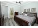 This bedroom is light and airy with an en-suite bathroom at 14252 Anastasia Ln, Orlando, FL 32828