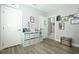 Bright room featuring ample storage, decor, and gray flooring at 14252 Anastasia Ln, Orlando, FL 32828