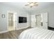 The primary bedroom offers easy access to a private ensuite bathroom at 14252 Anastasia Ln, Orlando, FL 32828