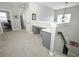 Bright bonus room with neutral carpet, built-in desk and storage is versatile for many needs at 14252 Anastasia Ln, Orlando, FL 32828