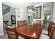 Open dining area featuring modern lighting and stylish floors at 14252 Anastasia Ln, Orlando, FL 32828