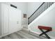 Inviting foyer features staircase, stylish floors, and a classic design at 14252 Anastasia Ln, Orlando, FL 32828