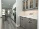 Spacious kitchen features stainless steel appliances, white cabinets, and open layout at 14252 Anastasia Ln, Orlando, FL 32828