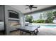 Outdoor area with pool and a summer kitchen, ideal for entertaining at 14252 Anastasia Ln, Orlando, FL 32828