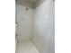 Tiled shower featuring a shower head at 1433 Bluff Loop, Dundee, FL 33838