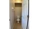 Powder room featuring a standard white toilet at 1433 Bluff Loop, Dundee, FL 33838