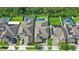 Overhead view of houses with brick driveways and lush green landscaping at 15343 Lebeau Loop, Winter Garden, FL 34787