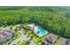 Birds eye view of homes near the community pool, splash pad, pool house, and playground at 15343 Lebeau Loop, Winter Garden, FL 34787