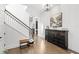 Entryway featuring hardwood floors, staircase, and elegant decor at 15343 Lebeau Loop, Winter Garden, FL 34787