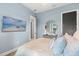 Bright bedroom with beach themed decor, a ceiling fan, and stylish furnishings at 1541 Chestnut Ave, Winter Park, FL 32789
