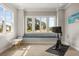 Bonus room featuring a window bench, Peloton bike, and natural light at 1541 Chestnut Ave, Winter Park, FL 32789