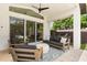 Relaxing covered patio with comfortable seating, perfect for outdoor entertaining at 1541 Chestnut Ave, Winter Park, FL 32789