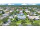 Scenic aerial view of a home with a well-kept lawn, situated in a lush neighborhood at 157 Bell Tower E Xing, Kissimmee, FL 34759