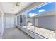 Relaxing screened-in patio featuring ceiling fan and block paved flooring at 157 Bell Tower E Xing, Kissimmee, FL 34759