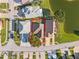 Aerial shot showcasing the property layout and location with a defined property line and mature trees at 16602 Citrus Pkwy, Clermont, FL 34714