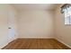 Simple bedroom featuring hardwood floors and a window that brings in natural light at 1746 Valley Forge Road, Orlando, FL 32806