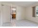 Neutral bedroom showcasing access to an adjoining bathroom at 1746 Valley Forge Road, Orlando, FL 32806