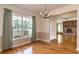 Formal dining room with chandelier, large window, and views to the living room at 1746 Valley Forge Road, Orlando, FL 32806
