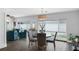 Open-concept dining area with wood-look floors and ample natural light at 1850 Geronimo Trl, Maitland, FL 32751