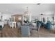 Open floor plan featuring a kitchen, dining area, and living room at 1850 Geronimo Trl, Maitland, FL 32751