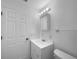 Bathroom featuring a vanity with sink, and a modern mirror at 1877 Courtland Blvd, Deltona, FL 32738
