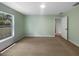 Inviting bedroom with neutral carpet, fresh paint, and natural light from the window at 1877 Courtland Blvd, Deltona, FL 32738