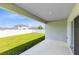 A view of the spacious backyard with a well-maintained lawn and privacy fence at 200 Garnet Ave, Kissimmee, FL 34758