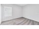 Neutral carpeted bedroom with bright window at 200 Garnet Ave, Kissimmee, FL 34758