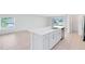 Modern kitchen island with stainless steel dishwasher and sink, providing ample counter space at 200 Garnet Ave, Kissimmee, FL 34758