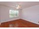 Bedroom featuring wood-look flooring and a ceiling fan at 200 Saint Andrews Blvd # 2607, Winter Park, FL 32792